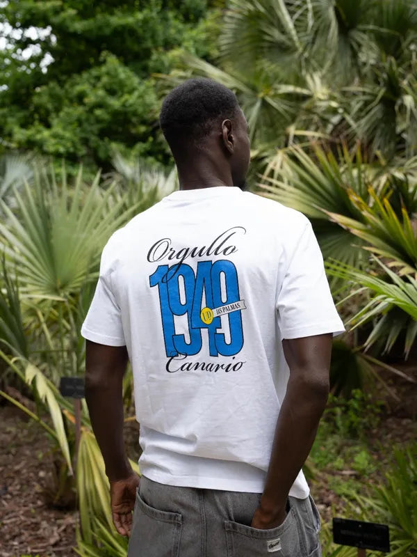 Camiseta blanca «Orgullo Canario 1949» de la cápsula con la UD Las Palmas